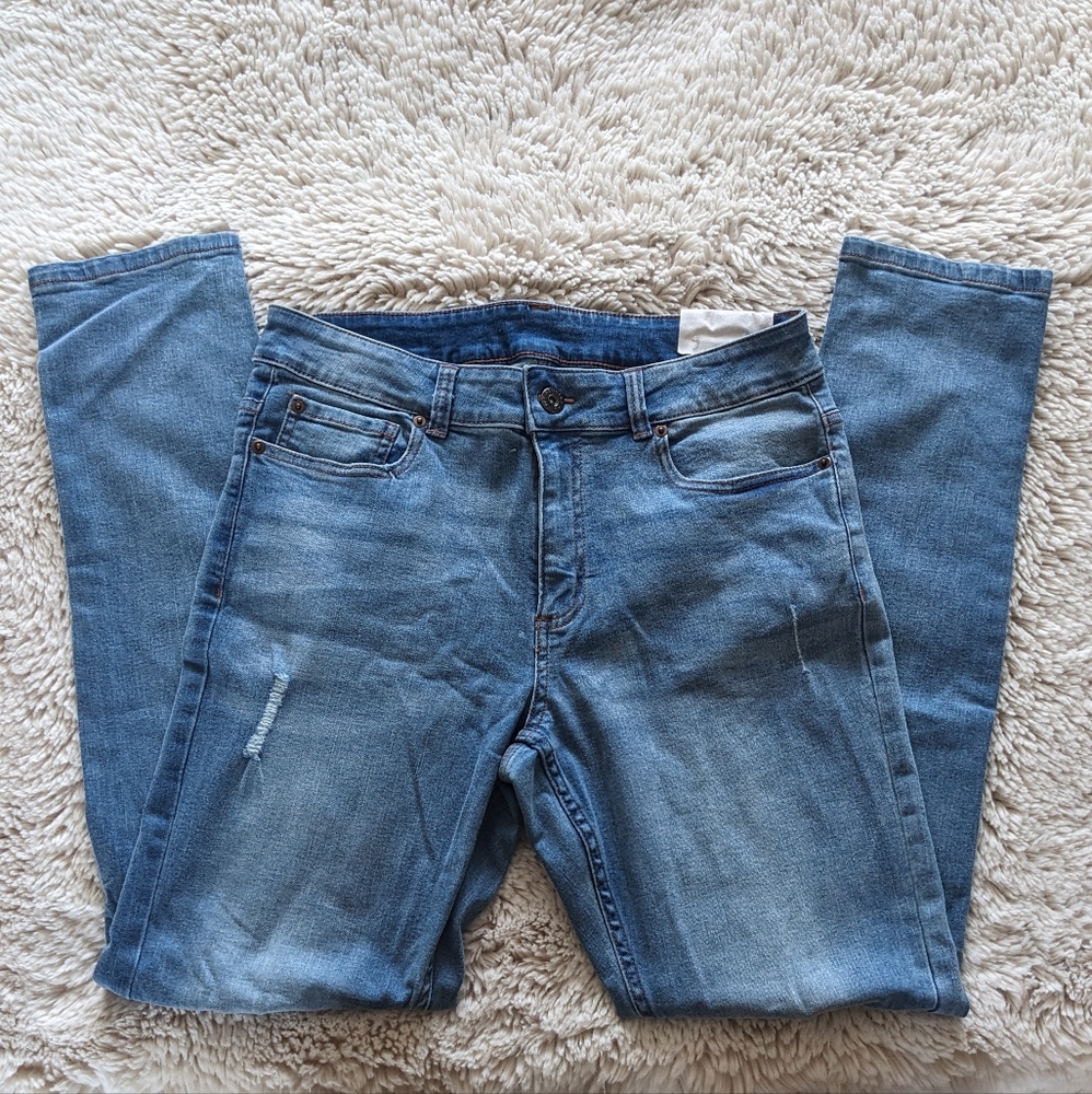 Medium Wash Slightly Distressed Skinny Jeans